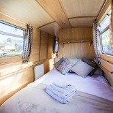 Interior bedroom on a narrowboat.